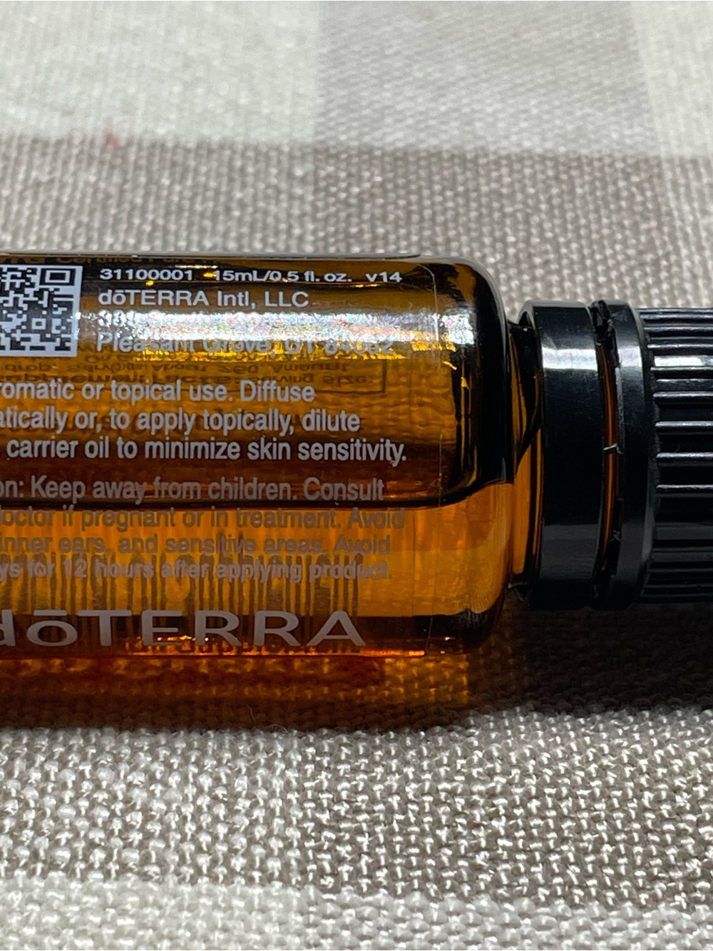 Doterra On Guard Essential Oil Bottle with Orange Label and Black Cap - Picture 4 of 5